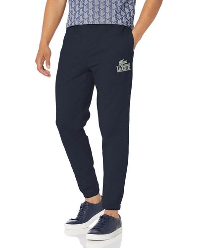 Lacoste Tapered Fit Sweatpants W/adjustable Waist & Medium Croc Graphic On The Front Hip - Blue