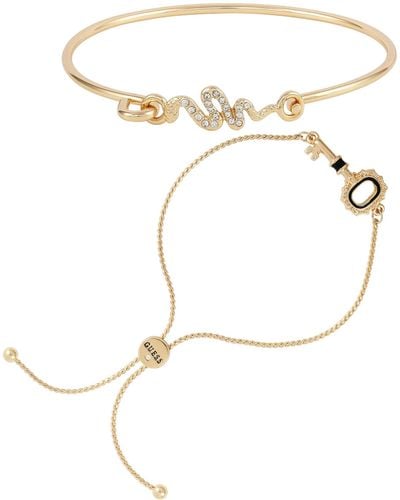 Guess Gold-tone Tension Bangle And Slider Bracelet Duo With Snack Pendant And Key Pendant Design - Metallic