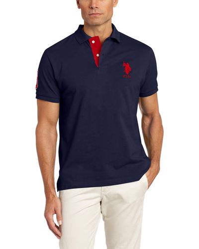 U.S. POLO ASSN. Slim Fit Solid Polo With Contrast Striped Underside Of Collar - Blue