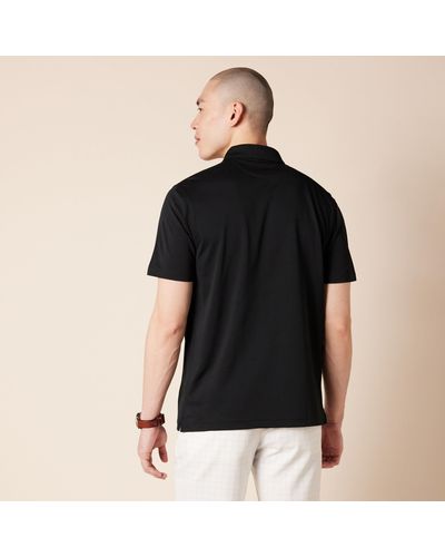 Amazon Essentials Sneldrogend Golfpoloshirt Met Slanke Pasvorm - Zwart
