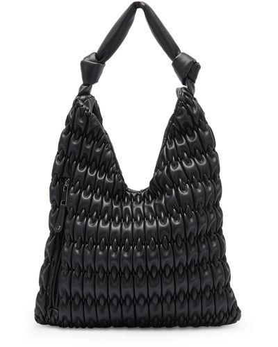 Women's Dolce Vita Hobo bags and purses from $148 | Lyst