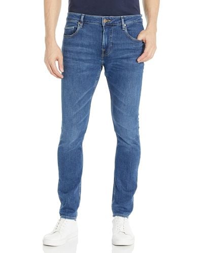 Guess Eco Chris Low-rise Skinny Jeans - Blue
