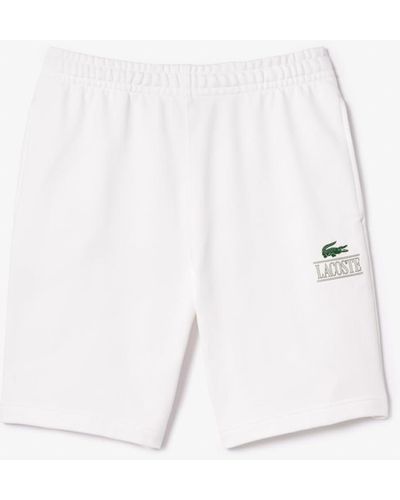 Lacoste Regular Fit Adjustable Waist Shorts W/medium Croc Graphic Near The Bottom Of The Leg - White