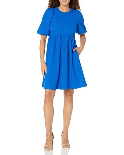 Maggy London Puff Short Sleeve Seersucker Dress With Curved Empire Waist And Shirred Above The Knee Skirt - Blue