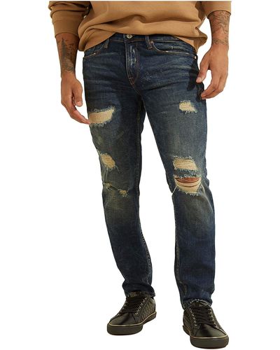 Guess Mid Rise Slim Fit Tapered Leg Ripped Jean - Blue