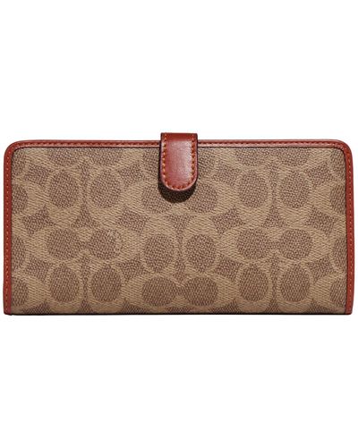 COACH Coated Canvas Signature Skinny Wallet - Brown