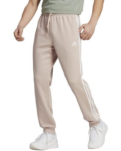 adidas Essentials Fleece Tapered Cuff 3-stripes Pants - Gray