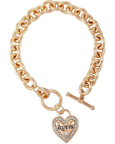 Guess Goldtone Dangle Logo Heart Charm Chain Toggle Bracelet - Metallic