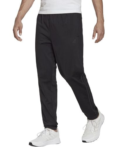 adidas Big & Tall Essentials Warm-Up Slim Tapered 3-Stripes Tracksuit Bottoms - Schwarz