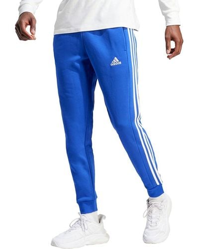 adidas Essentials Fleece Tapered Cuffed 3-stripes Pants - Blue