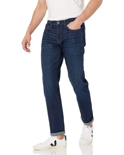 Amazon Essentials Jeans Elasticizzati a Vita Alta vestibilità Aderente Uomo - Blu