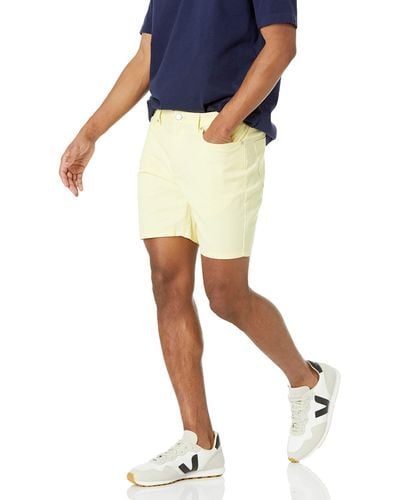 Amazon Essentials Pantaloncini elasticizzati con cuciture interne vestibilità aderente interno gamba 18 cm Uomo - Giallo