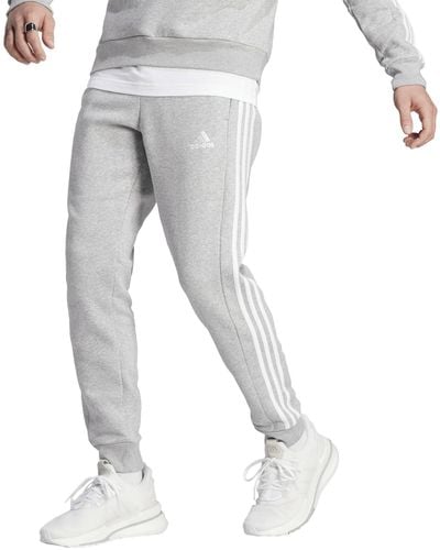 adidas Essentials Fleece Tapered Cuffed 3-stripes Pants - Gray