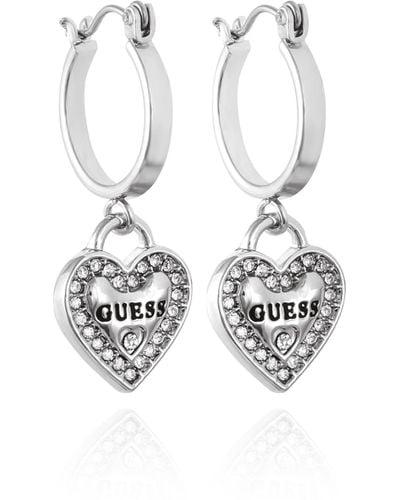 Guess Silvertone Logo Heart Dangle Charm Hoop Earrings - Metallic