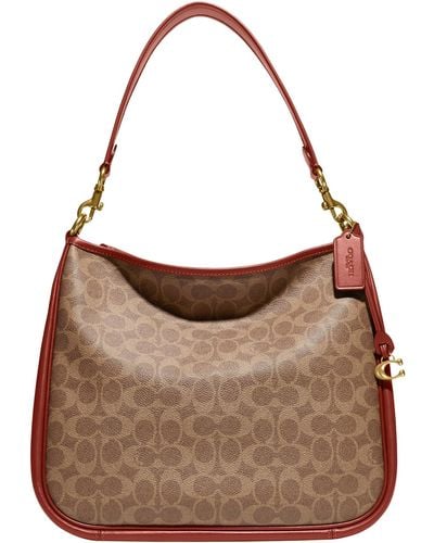 COACH Coated Canvas Signature Cary Shoulder Bag - Brown