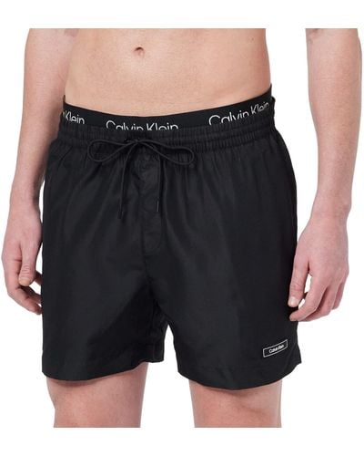 Calvin Klein Pantaloncino da Bagno Uomo Medium Double WB Lungo - Nero