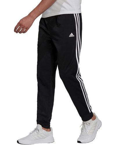 adidas Primegreen Essentials Warm-up Tapered 3-stripes Trainingsbroek - Zwart