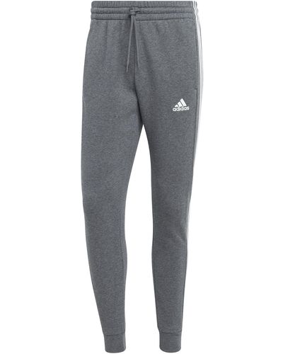 adidas joggingbroek Essentials Fleece 3-stripes Tapered Cuff - Grijs