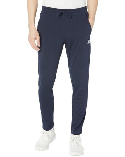 adidas Pantalon Essentials en jersey simple ourlet ouvert fusel pour homme - Bleu