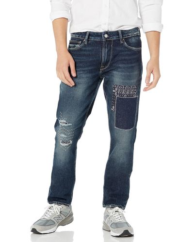 Coated Denim Slim Tapered Zip Jeans