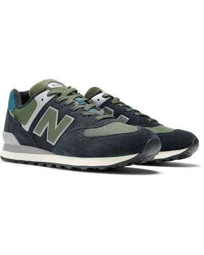 New Balance 574 in schwarz/grau - Blau