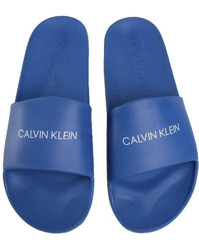 Calvin Klein Ciabatte uomo mare o piscina swimwear CK articolo KM0KM00498 ONE MOLD SLIDE - Blu