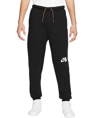 Nike Pantaloni in pile da - Nero