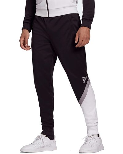 adidas Essentials 3-Stripes Tapered Tricot Pants - Schwarz