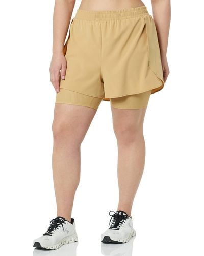 Amazon Essentials Pantalón Corto para Correr de Tejido Elástico de Doble Capa Mujer - Neutro
