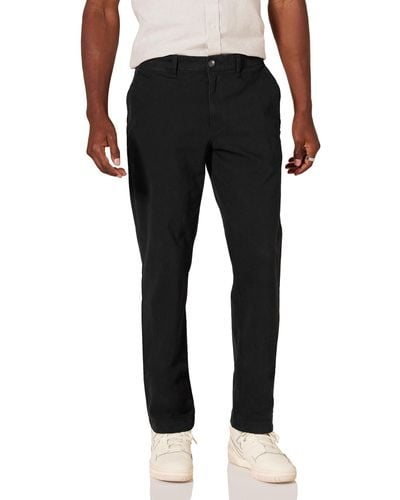Amazon Essentials Pantaloni Chino Elasticizzati Casual vestibilità Aderente Uomo - Nero