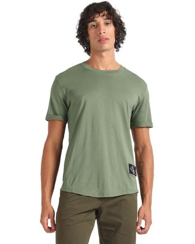 Calvin Klein T-Shirt Kurzarm Badge Turn Up Sleeve Rundhalsausschnitt - Grün