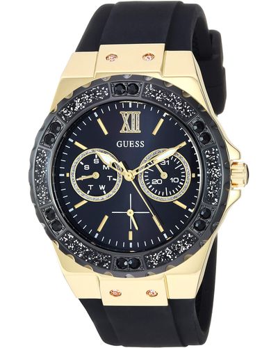 Guess Gold-tone Stainless Steel + Black Stain Resistant Watch With Day + Date Functions. Color: Black - Gray