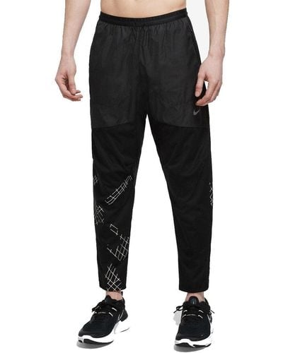 Nike Storm-FIT Run Division Phenom Elite Pantalon de running pour homme Noir/argenté réfléchissant Taille L