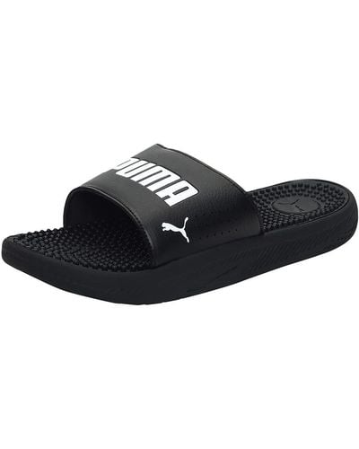 PUMA Fashion Shoes SOFTRIDE SLIDE MASSAGE Slide Sandal - Negro