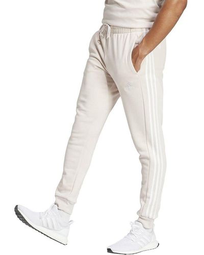 adidas Essentials Fleece 3-Stripes Tapered Cuff Pants Pantaloni - Neutro