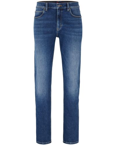 HUGO 708 Blaue Slim-Fit Jeans aus besonders softem Denim Blau 30/34