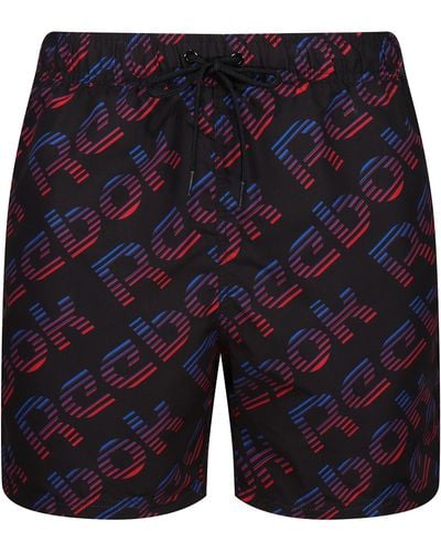 Reebok S Swim Trunks In Allover Black & Red Branded Print - Blue