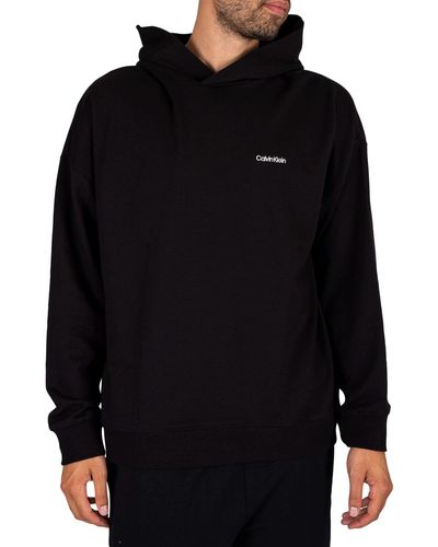 Calvin Klein Felpa comfort nera con cappuccio e riquadro con logo - Nero