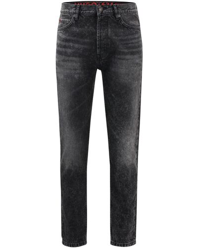 HUGO 634 Schwarze Tapered-Fit Jeans aus festem Denim Dunkelgrau 33/32