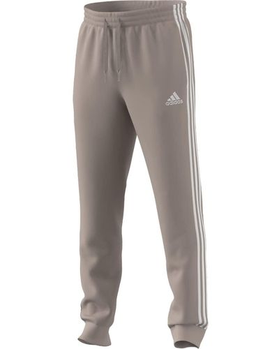 adidas Pantalon Essentials en polaire revers fusel 3 bandes pour homme - Gris