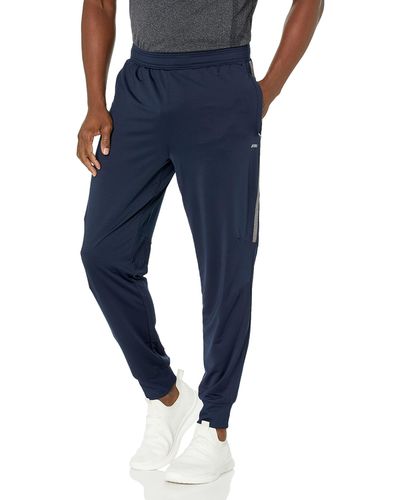 Amazon Essentials Pantalón Jogger de Alto Rendimiento en Punto Elástico Hombre - Azul