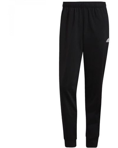 adidas joggingbroek Essentials Warm-up Tapered 3-stripes - Zwart