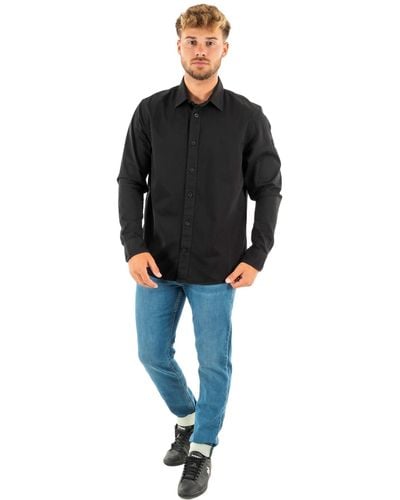 Calvin Klein Jeans MONOLOGO Badge Relaxed Shirt J30J323255 Camicie Casual - Nero