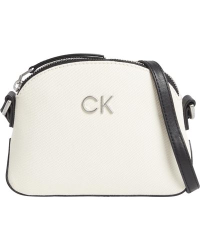 Calvin Klein Re-Lock Xbody Canvas Umhängetasche K60K611793PC4 in weiß - Schwarz