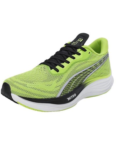 Puma black deals and green shoes
