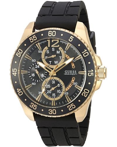 Guess U0798g3 Sporty Gold-tone Stainless Steel Watch With Multi-function Dial And Black Strap Buckle