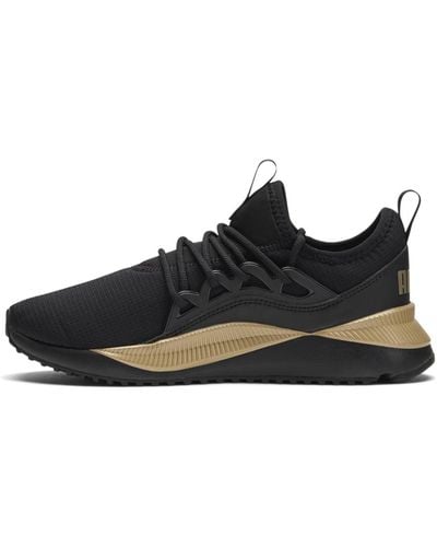 Black and outlet gold pumas 6.5