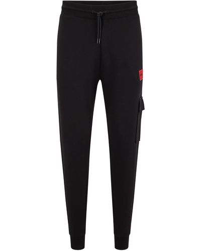 HUGO Dwellrom Relaxed-Fit Jogginghose mit rotem Logo-Label Schwarz S