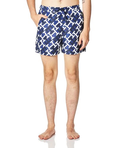 Tommy Hilfiger TH Monogram mittellange Badeshorts mit Print - Blau