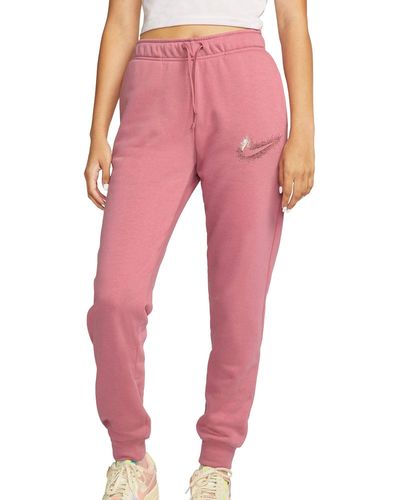 Nike Pantaloni sportivi da donna Sportswear Stardust - Rosa